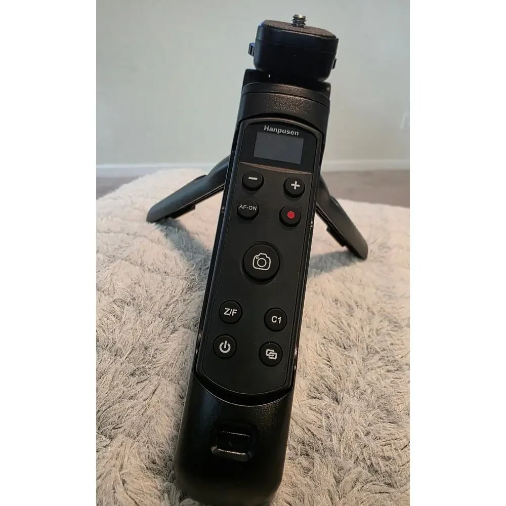 Hanpusen Wireless Remote Control Tripod Grip for Digital Cameras